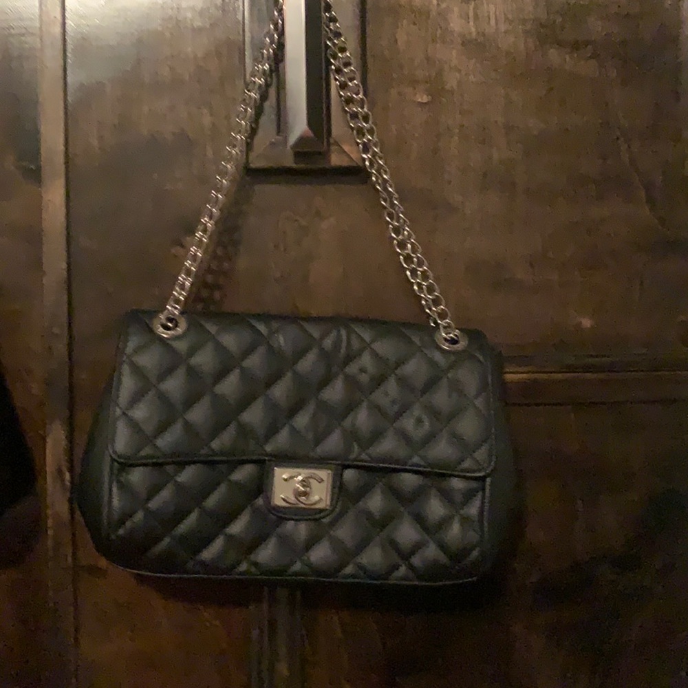 Black Chanel bag w/ silver chain